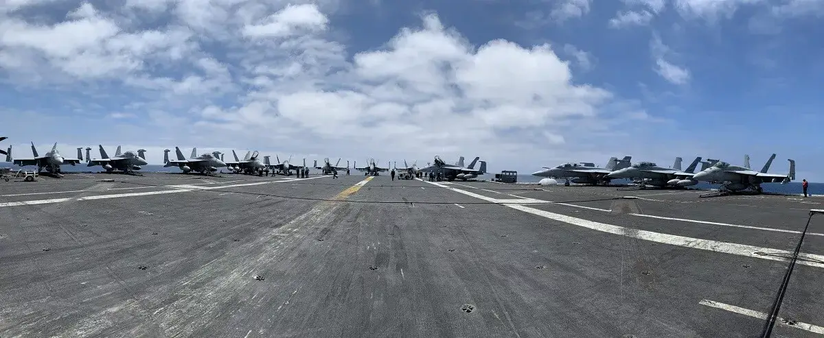 Embarked F/A-18 fighter jets on flight deck